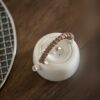 Rattan Handle Milky White Ceramic Kung Fu Teapot