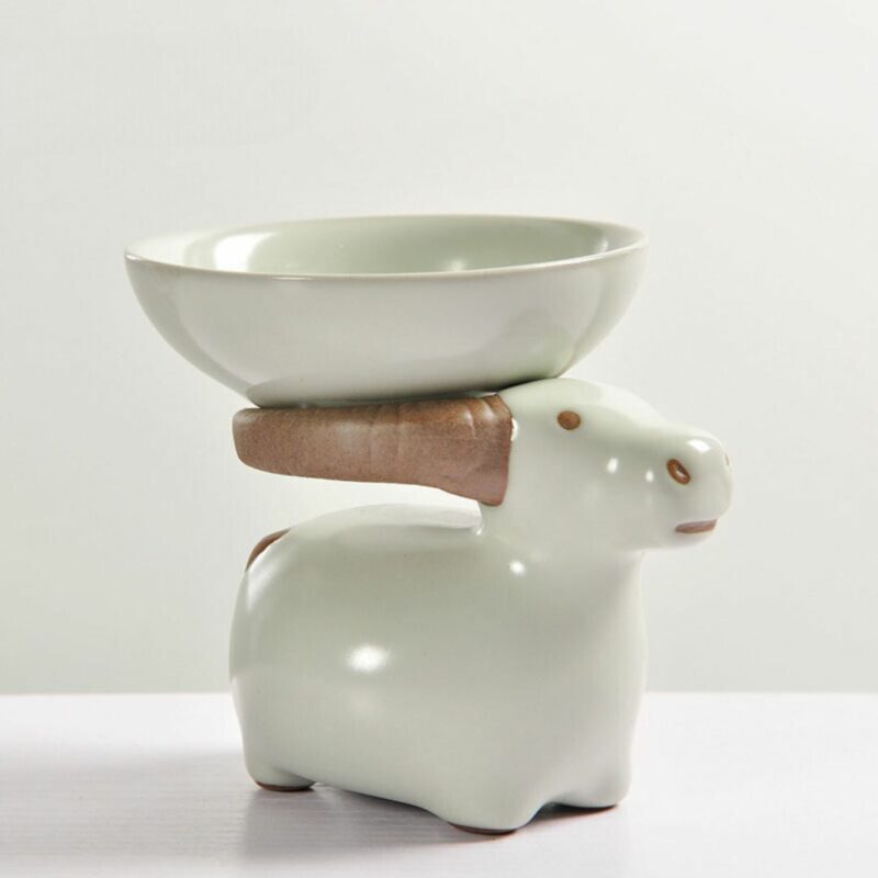 creative-ceramic-ru-ware-little-cattle-filter-holder-tea-pet-2