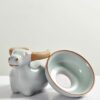 creative-ceramic-ru-ware-little-cattle-filter-holder-tea-pet-5