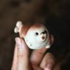 handmade-white-duanni-smiling-seal-tea-pet-1