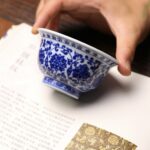 Fully Hand-painted Qinghua Ceramic Twined Lotus Two Lions 120ml Tea Cup