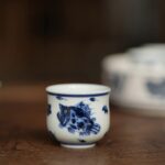 Hand-painted Qinghua Ceramic Peach Blossom Fish 40ml Tea Cup